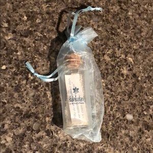 Halekulani sand in a bottle souvenir.